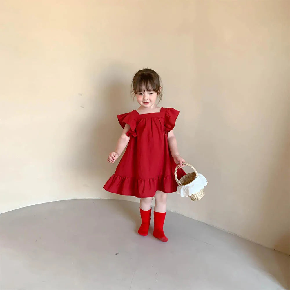 Flutter Ruffled Dress with Bow